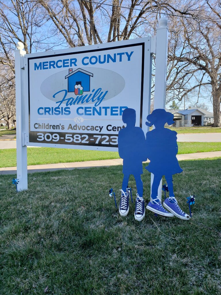 A sign that says mercer county family crisis center.